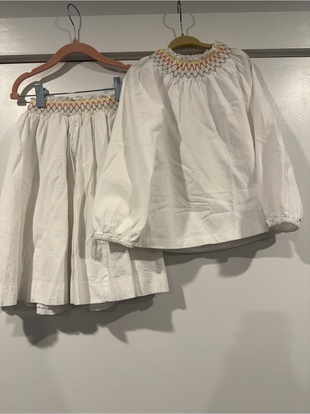 White matching set with colored trim